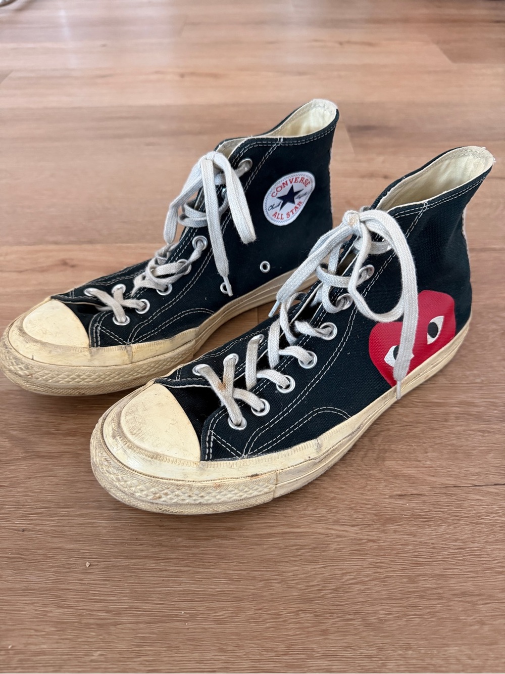 Converse Black High-Top Sneakers with Red Heart Logo